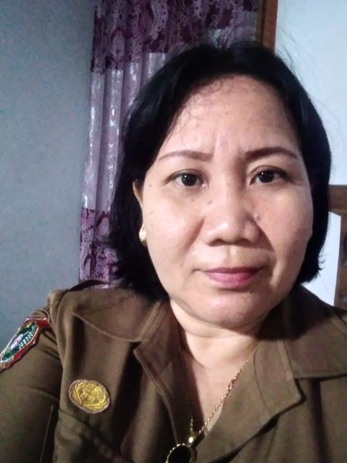 Kristine,S.Pd